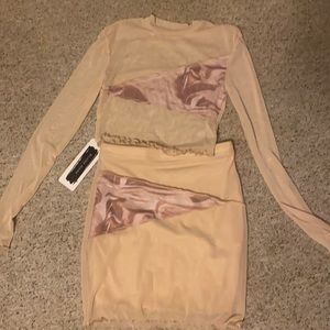 2 piece khaki/tan set brand new still has the tags bought L fits as a m/s